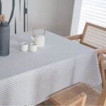 Striped linen blend tablecloth styled with teaware for afternoon tea