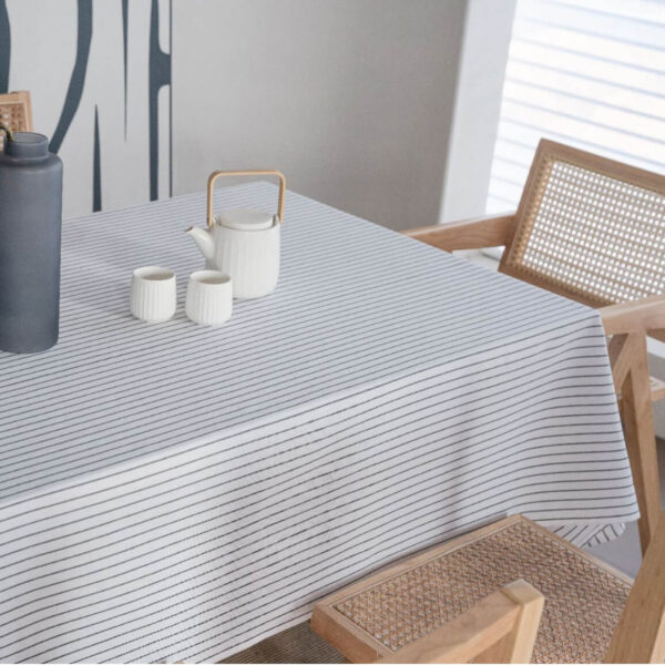 Striped linen blend tablecloth styled with teaware for afternoon tea