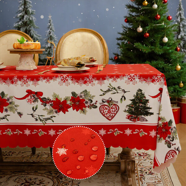 Holiday tablecloth with poinsettia and snowflake festive print