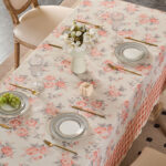 Decorative floral tablecloth styled with tableware for home display